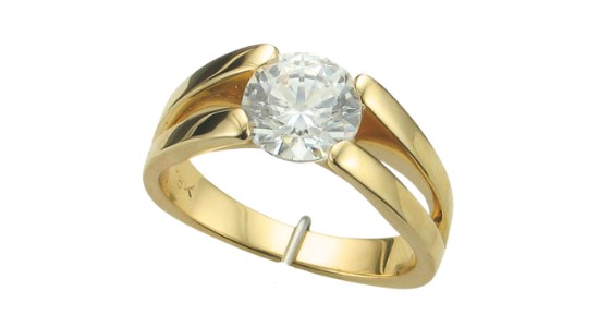 A thick split shank yellow gold engagement ring from Claude Thibaudeau, available at GMG Jewellers.