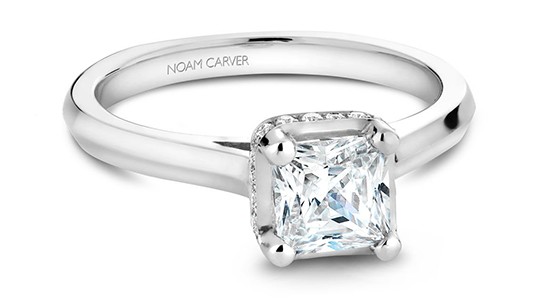 A white gold hidden halo engagement ring by Noam Carver, available at GMG Jewellers.